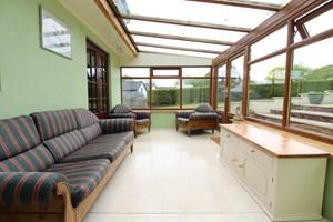 Sun Room 16' 0" x 9' 5" (4.88m x 2.87m) Delightful west facing room that overlooks the gardens and grounds.