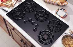 Profile 36" Built-In Gas Integrated Downdraft Cooktop JGP656BB Black on black Tempered glass cooktop Continuous cast grates 350 CFM retractable