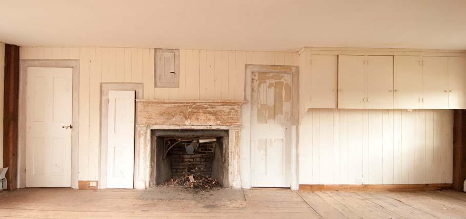 Although this room has undergone extensive modifications during the 20th century much of the original fabric survives; Fireplace, mantel and hearth Flooring Cupboard above the fireplace North doors