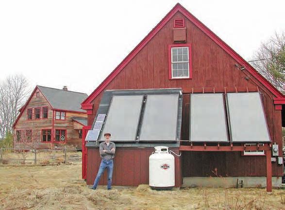Solar Heat by Guy Marsden Expanding & Improving an Owner-Installed System The author with his expanded solar thermal system that provides heat for his office and workshop.