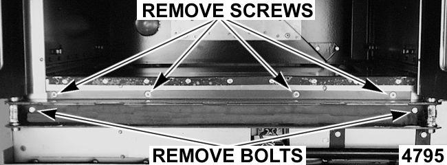 38 3. Remove the top bearing retainers and top bearings. A. Remove the two (2) lower sill bolts by the lower door shaft and the four (4) countersunk screws from the lower sill. Fig.