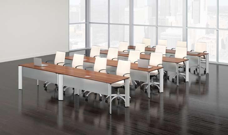 Modern conference and training table design integrates power and data, effectively hiding wires, plugs