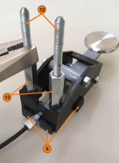 Insert cable end clamp (5) completely into the hook of lever (7). Take care to position beam (11) in the opening of lever (7). 4. Remove the Kick Board (KB) 5.