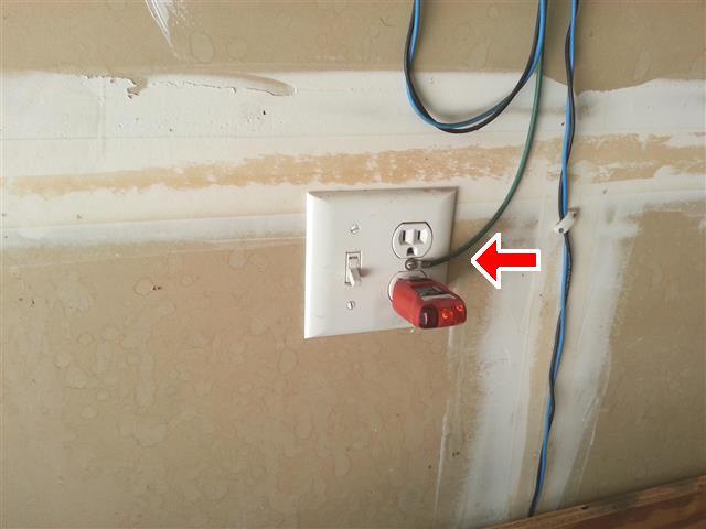 7.4 The outlet(s) shown in photo(s) is/are grounded, but lacking GFI protection in the garage and in the laundry