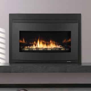 With black glass media and elegant Halo front this modern fireplace is sure to