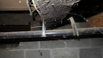 Suggest installation of sister joist or remove and replace of damaged joist. Twisting at main beam.