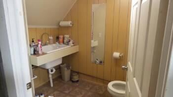 Half Bath Utility room Toilet functioned properly at time of inspection.