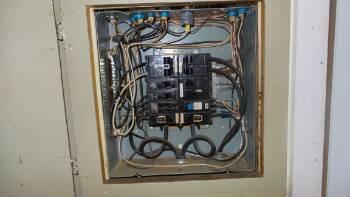1. Electrical Panel Utilities Unit 4 Materials: Service Entrance - Overhead Service Panel Amperage - 100 Amp Service Main disconnect at exterior meter Panel box located at kitchen Panel Manufacturer