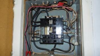 1. Electrical Panel Utilities Unit 5 Materials: Service Entrance - Overhead Service Panel Amperage - 100 Amp Service Main disconnect at exterior meter Panel box located in kitchen Panel Manufacturer