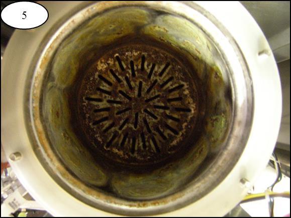 Photograph or document the condition of the combustion chamber. Record the duration from installation to the first cleaning, as this will aid in developing a cleaning schedule.