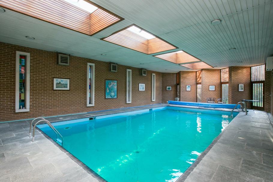 Direct access from both rear hallway and rear garden. SWIMMING POOL: 47' 9" x 28' 0" (14.55m x 8.53m) Indoor heated pool (32ft x 18ft). Covered. Additional plunge room (currently covered by hot tub).