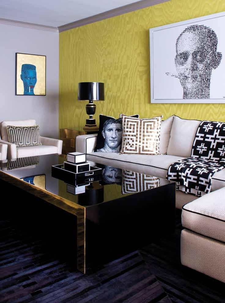 Custom furniture and Silk Moire wallpaper imported from Milan give a modern touch to the living room space.