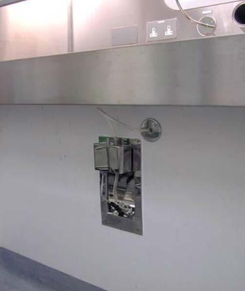 outside cleanroom due to distance to sample probe head, so installed in clean area in stainless steel