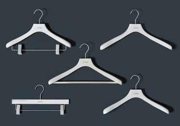 with clips Coat hangers with trouser clips Coat hangers for men Coat hangers for women The matt lacquer surface in shell features the interlübke logo.