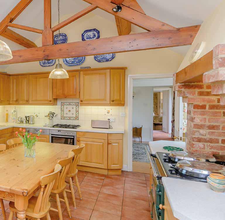 The kitchen/breakfast room has delightful views of the rear gardens and the 12th century Motte, there are two double glazed windows overlooking the forecourt, the twin plate Aga creates a focal point