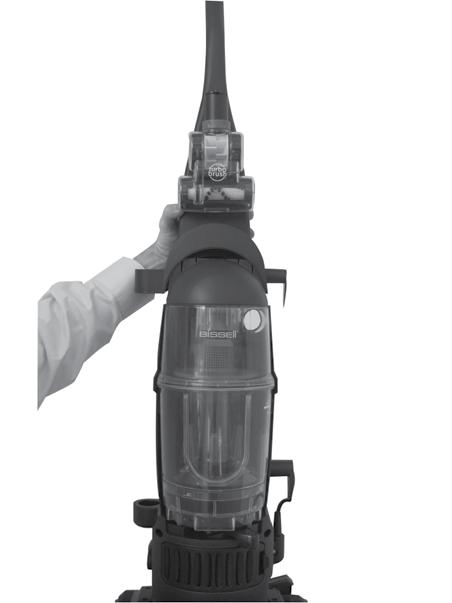 NOTE: The powerfoot will not operate effectively unless the hose wand is firmly attached. 4. Slide the extension wand and the crevice tool together into the storage clip on the side of the vacuum. 5.