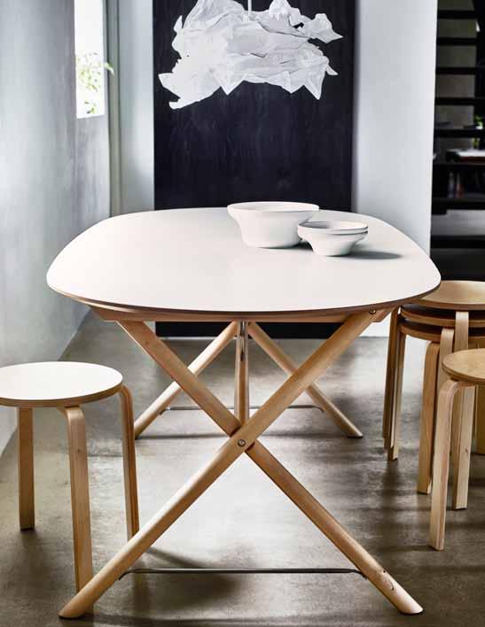 30 PH123249 This table combination brings a calm, modern look to the room.