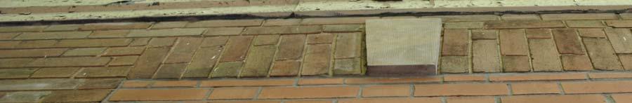 coloured brick walls including all detailing: quoins, voussoirs, parapet and keystones Rubble limestone