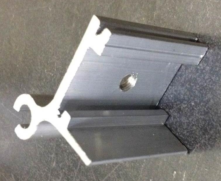 the roof. Figure 4 Swivel Clip and Top Bracket The legs are 1.5 square aluminum tube with holes at the bottom which are connected to the channel feet with a 2 long ¼-20 bolt.