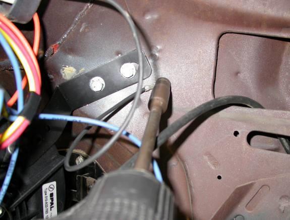 Reinstall passenger fresh air cable to bottom of dash using original hardware. Locate in control sack kit the main wire harness.