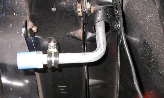 Using the o-rings and a few drops of mineral oil. Slide condenser into place and tighten (4) radiator mounting bolts.