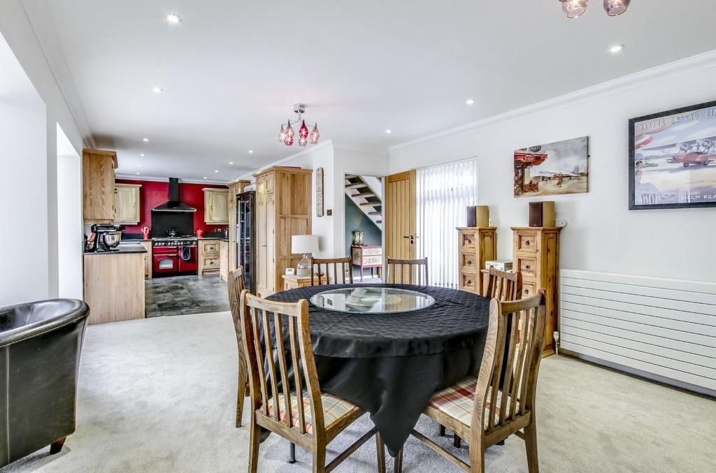 Dining/Family Room arranged as three zones including a 15' 6'' Bespoke Fitted Kitchen Area.