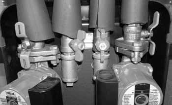 If there is a leak or other issue requiring the collector loop to be drained, turn the system off by setting the switch on the left side of the differential control to the OFF position.