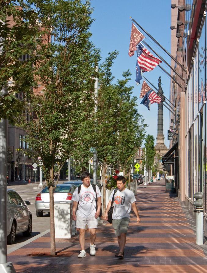 Downtown, trees and planters provide green and