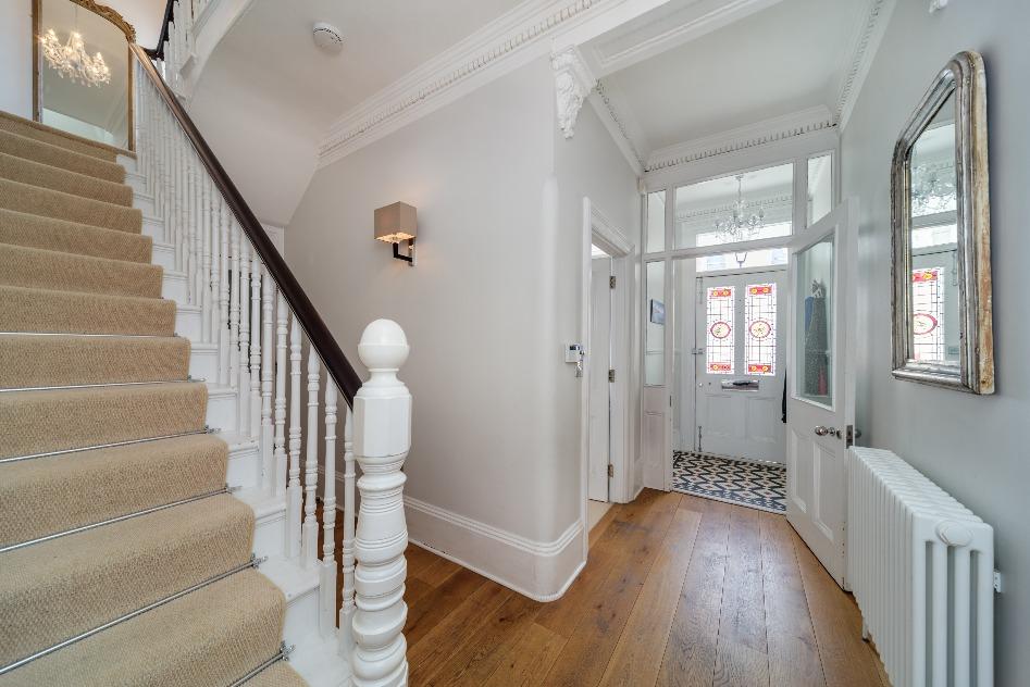 One of only four Villas in this architectural style, with square bays and carved gables there s also a rare to find side door, ideal for the family and pets to come in by as it leads to a lobby with
