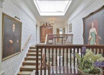 FIRST FLOOR The sweeping staircase curves round to a half landing where it splits, leading to a lower landing with five bedrooms of