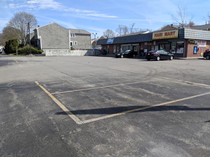 In regards to the non-existence of physical boundaries between parking spaces, the board may wish to have the applicant install wheel stops for all parking spaces adjacent to the sidewalks.