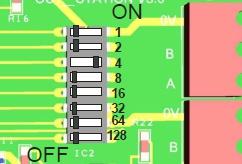 the switches are labelled 1 to 8 and each has a value as follows: 1 = 1 2 = 2 3 = 4 4 = 8 5 = 16 6 = 32 7 = 64 and 8 = 128.