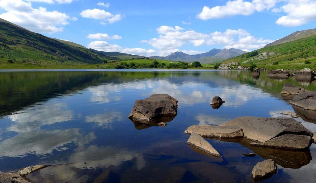 Day 6. Reach Snowdon via the famous Mountain Railway The highest peak in England and Wales is Mount Snowdon. Craggy mountains, steep valleys and jewel-like lakes make up Snowdonia National Park.