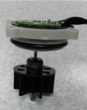 Flow meter is a device located on the inlet side of water heater and consists of 4 Phillips head screws and a small black wire (see image below) ii.