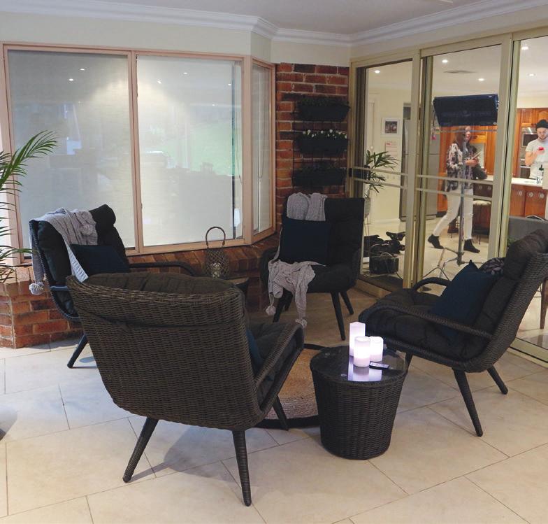 at the opposite end. Robyn can use the L-shaped lounge and armchair for entertaining friends with a glass of wine or relaxing as she watches the girls play in the pool.