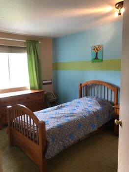 1. Location Location Southeast Bedroom 1 2. Bedroom Room Walls and ceilings appear in good condition overall. Flooring is carpet. Heat register present.