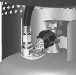 Place cylinder in position as shown. Note: The cylinder must be positioned as shown in the patio heater cylinder chamber to provide vapor withdrawal.