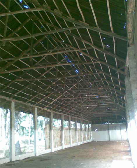 Roofing design and detailing: The roof is a 30-degree gabled roof consisting of regular spaced timber truss with cross purling and battens to support clay-tiled roof.
