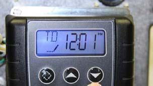 Set the time on the system to 12:01 PM by pressing either the UP or DOWN arrow as shown in picture below.