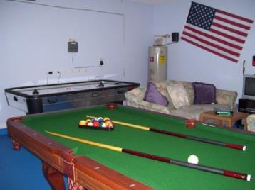 Our two car garage has been converted to a new Games Room and includes; 7foot Pool/Billiards, 7foot Air Hockey, electronic darts, digital-cable Smart-TV, Gamecube with games and Smart-DVD player.