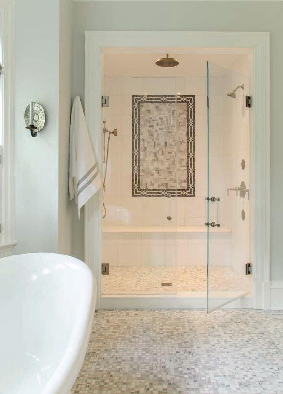 Diane Shaw conjures a crisp, classical vibe in a Potomac master bath Gray-veined Carrara marble tiles adorn the floors as well as the decorative mosaic in the shower (this page).