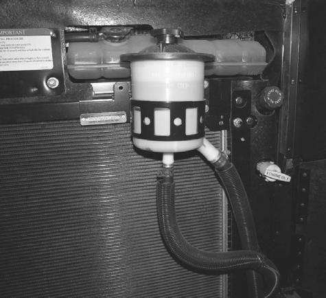 Air Filter Restriction Indicator Engine Oil Fill Rear Engine (Shown with grille panel open) * Driver Side Transmission Fluid Fill/Dipstick Diesel Fuel/Water Separator