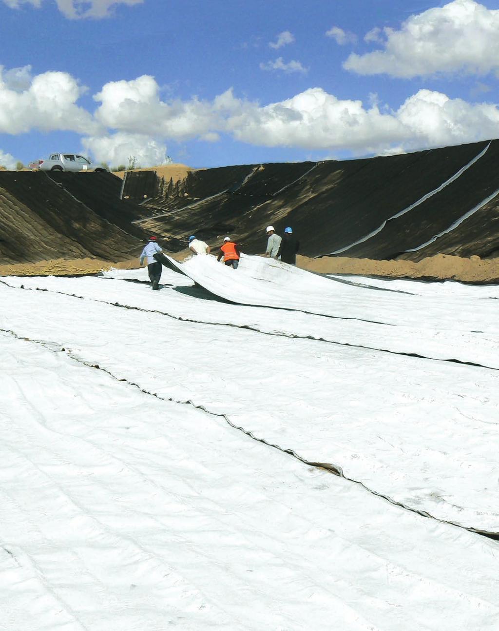 FIGURE 1 Installing a geotextile filter at a tailing pond.