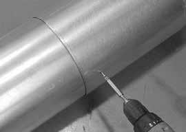 Secure the pipe and slip section with two screws no longer than 1/2 in. (13 mm), using the pilot holes in the slip section. See Figure 7.6. C.