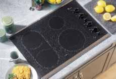 CleanDesign Electric Cooktop JP930SC Stainless steel Frameless cooktop Four ribbon heating elements: one 6", one dual (6"/9") and two 7" with connecting bridge burner Four hot surface indicator