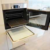 telescopic shelves reduce reach INDUCTION COOKTOP No flames and controlled heating zones increases safety