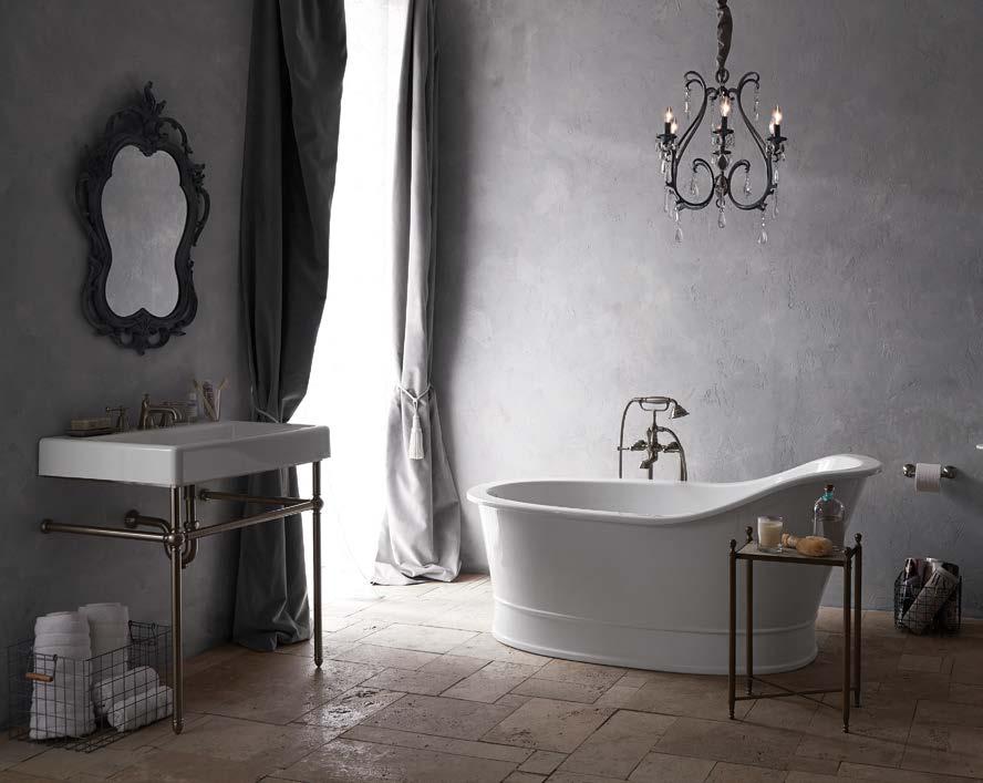 BELOW: The en suite contains a standalone tub