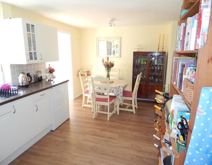 0m A well-proportioned public room, with double glazed window overlooking the front garden and