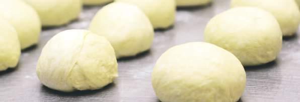 Dough Splitting and Scoring Reduce waste product and downtime through spray technology In many baked goods processes a reliable dough splitting and scoring system is often required as the traditional