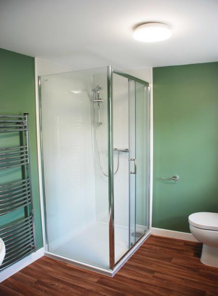 En-suite: 8 x 6 4 Window west facing; white wc and whb; large